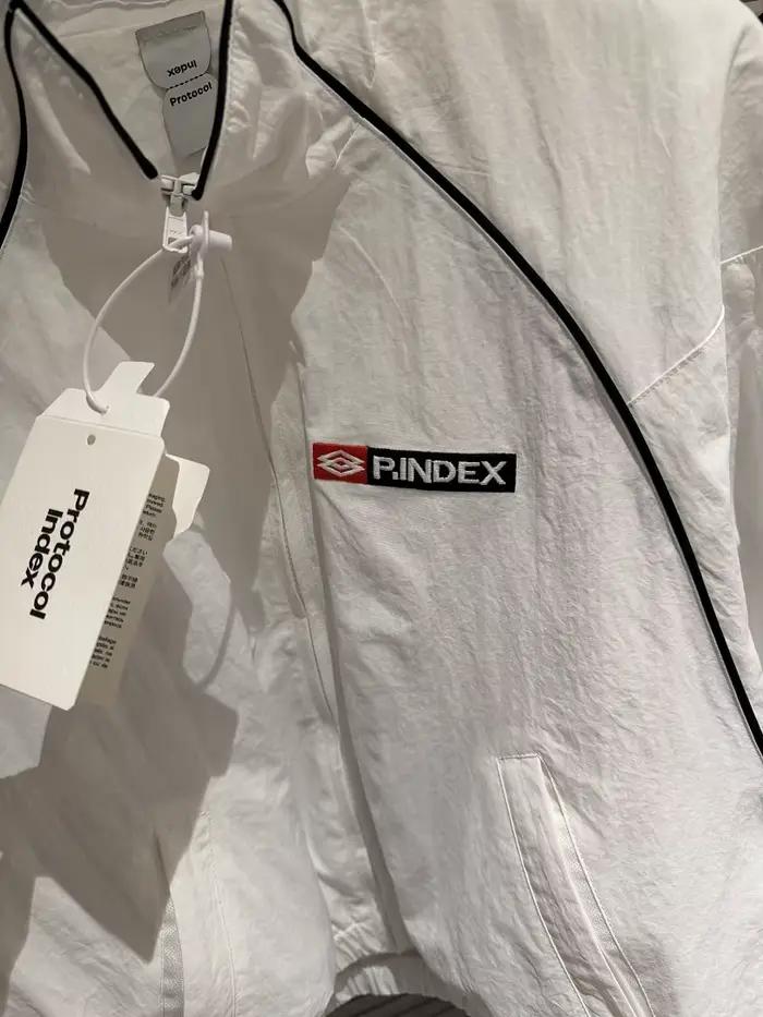 Veste coupe-vent unisexe 2026SS avec logo brodé, style streetwear oversize, veste décontractée pour homme avec intérieur en mesh