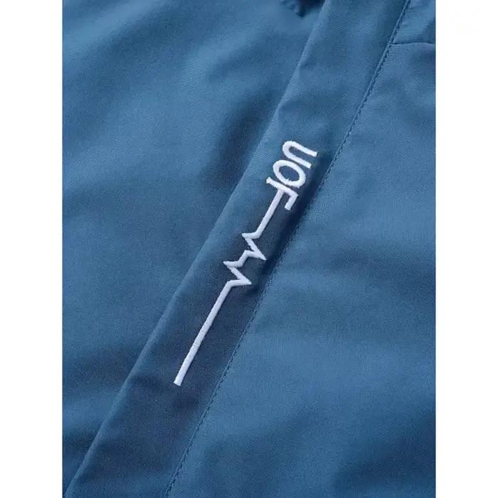 La veste coupe-vent et imperméable est imprimée avec le motif « YAMA » et est de coupe ample, idéale pour les passionnés de moto.